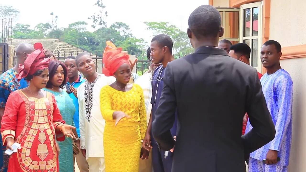 Cooperative members gathered together outside a building